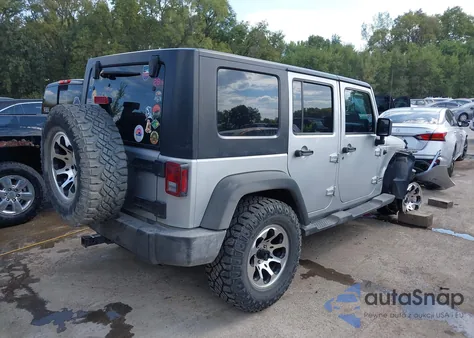 2010 Jeep Wrangler Unlimited Sport из США, поврежденный, VIN 1J4BA3H13AL159030